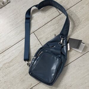 Baggallini blue Sling Belt Bag…Central Park sling
NWT ..authentic